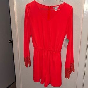 Neon coral dressy flared sleeve romper
